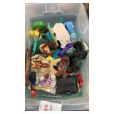Plastic tub with assorted toys