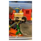 Plastic tub with assorted toys