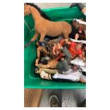 Plastic tub with assorted plastic figurines