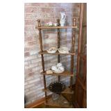 Goods on etagere tea cups egg plate asst