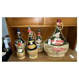 5 Italian basket wine bottles- some sealed