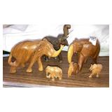 5 carved wood elephants - largest is 7" long