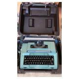 Coronet electric typewriter in case