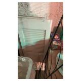 Pair of white wooden shutters