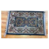 Small fringed rug 40" x 27"