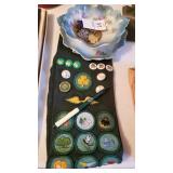 Old Girl Scout badges and sash