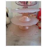 Three serving plates can be stacked