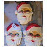 Three Santas ceramic wall decor. Ho Ho Ho