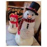 2 snowmen lighted, one missing cord