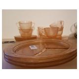 Pink Depression glass dinner plates, salad