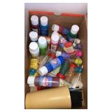 Shoebox of craft paints brushes