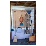 Brooms shovels rake lot