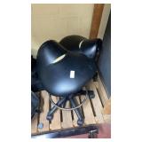 2 rolling saddle stools