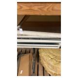 Stack of heavy glass hinged mirrors