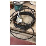 Extension cord on metal carrier