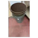 4 metal garbage cans