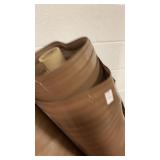 Roll of brown rubber mat