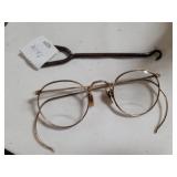 Vintage glasses and Prudential buttonhook