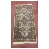 27 inch by 54 inch rug