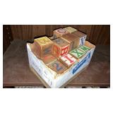 Box of antique wooden ABC blocks