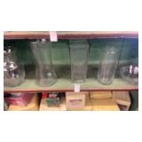 Shelf lot of glass vases