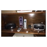 2 cordless phones. 2 clock radios
