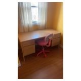 Wooden desk with pink office chair