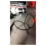 Glass top table. 20 dia x 17 tall