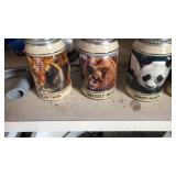 5 Beer steins   Budweiser endangered species.