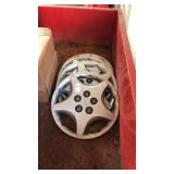 4 Chevy hubcaps