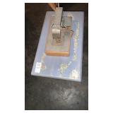 Foot stool and small vintage sewing machine