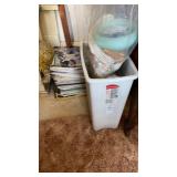 Trash can and magazines