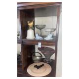 Shelves of glass and decorative items