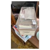 Clear organizer bins with contents