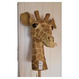 Giraffe head on cane pole