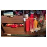 Drawers and shelf of candles and Christmas