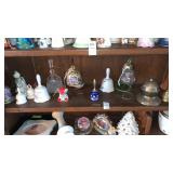 Shelf lot of bells and other
