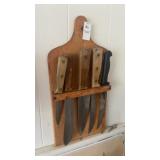 Kitchen knives in board