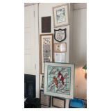 Wall of pictures and plaques