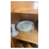 Shelf lot of bowls and plates