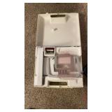 Husqvarna Viking embroidery implement and sewing