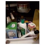 Cleaning supplies under sink