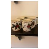 Set of four hand decorated Holly mugs
