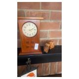Wooden clock and animal carvings