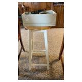 Box of ratchet tiedowns and kitchen stool