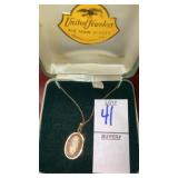 Small cameo filigree pendant on 12kgf chain