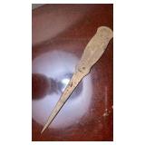 Antique advertising letter opener Clarence