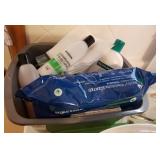 Little tub filled with skin lotion, wipes,