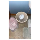 Garbage, cans and bathroom brush