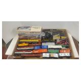Assorted engines, and box cars